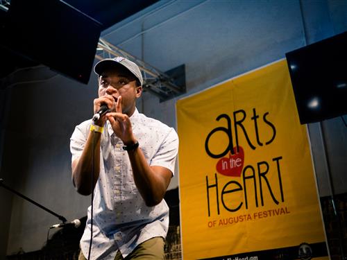 Kayton performing at Arts in the Heart 