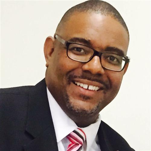 Lynwood W. Holmes 